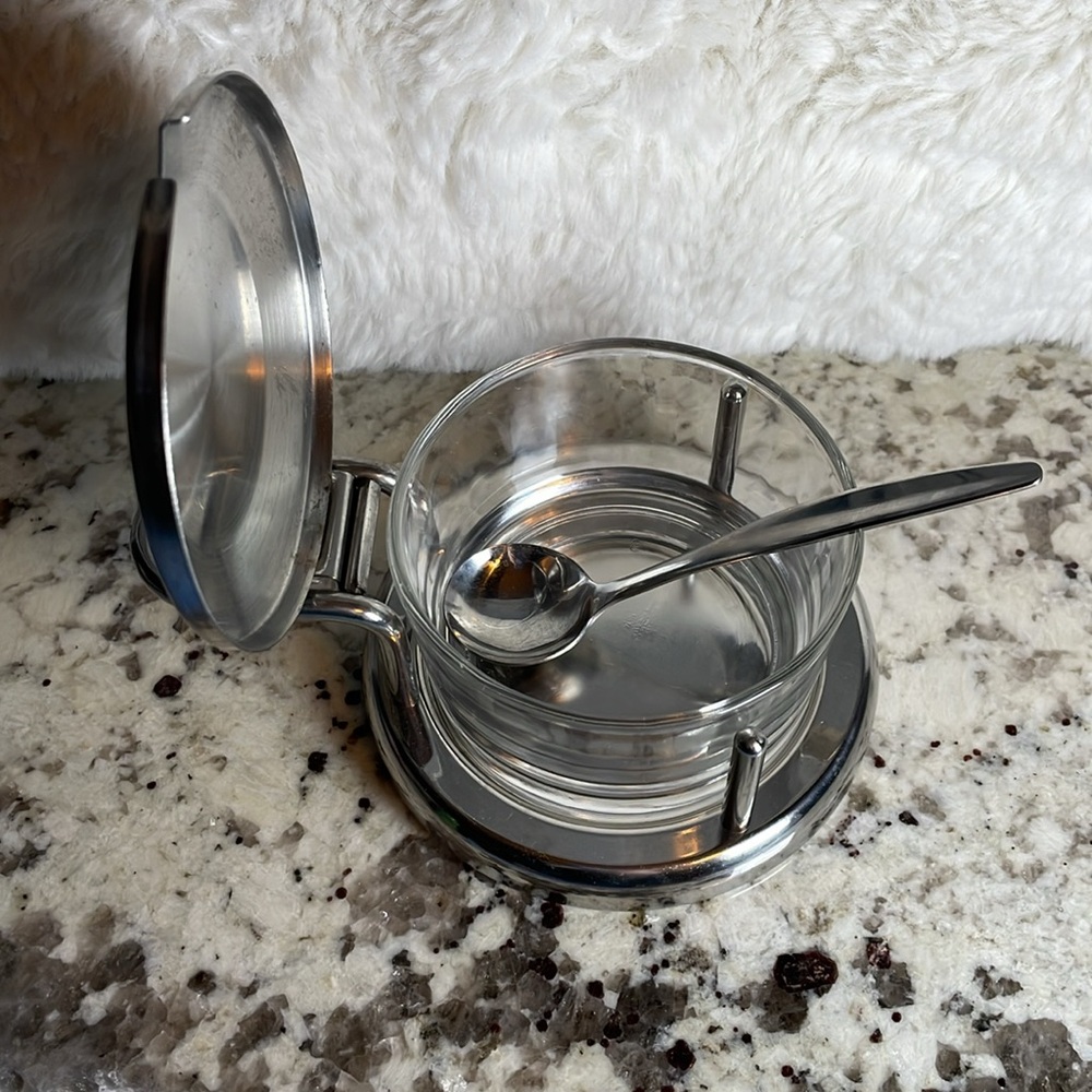Vintage Parmesan cheese dish with spoon